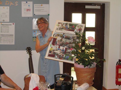 Zum Abschied eine gerahmte Bildcollage mit dem Titel "Alles Gute für die Zukunft wünscht Dir Dein Haus Fischbachtal"